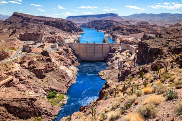 Hoover Dam spanning a desert canyon