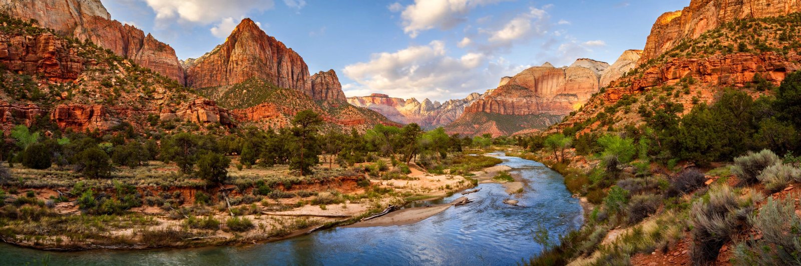 Red rock canyon cliffs and a winding river in an American national park